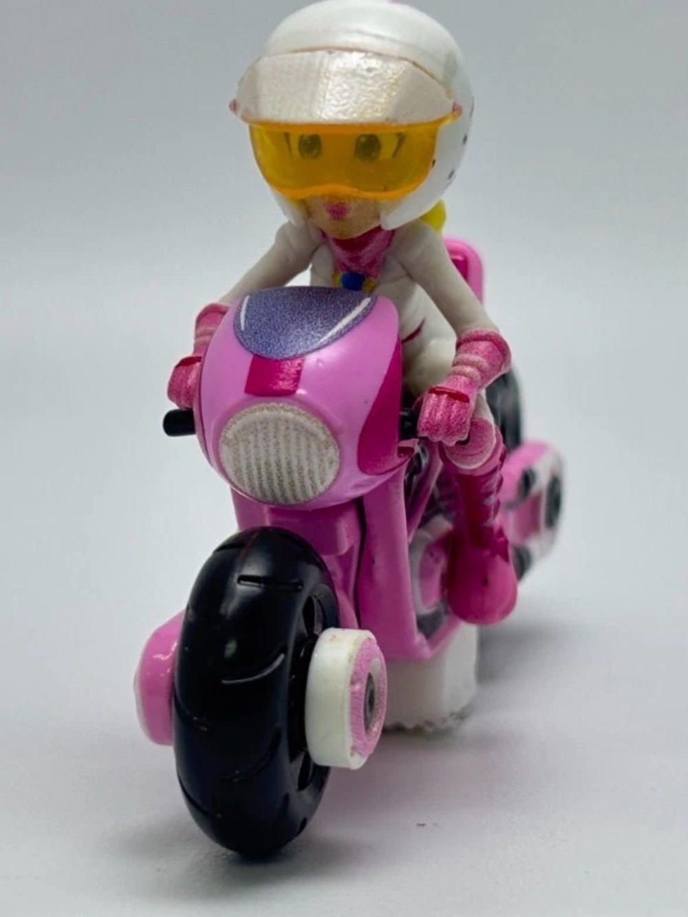 The Hot Wheels Mario Kart 4 Pack Super Mario Bros Movie featuring Princess Peach